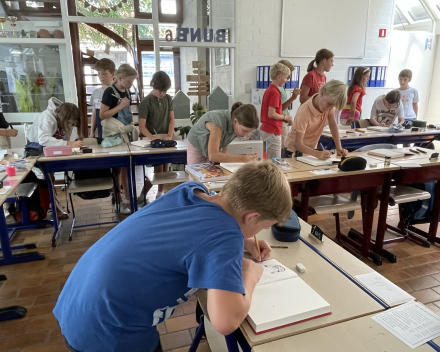 Werken in ons muzeboek.