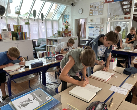 Werken in ons muzeboek.